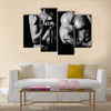 Bodybuilding, Strong man and a woman posing on a black background, Multi panel canvas wall art