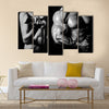 Bodybuilding, Strong man and a woman posing on a black background, Multi panel canvas wall art