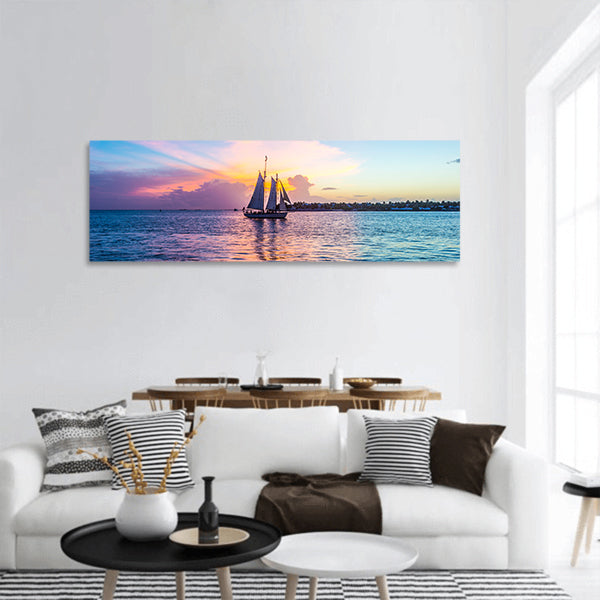 Sunset at Key West with sailing boat and bright sky panoramic canvas wall art