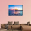 Sunset at Key West with sailing boat and bright sky multi panel canvas wall art