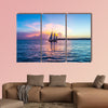 Sunset at Key West with sailing boat and bright sky multi panel canvas wall art