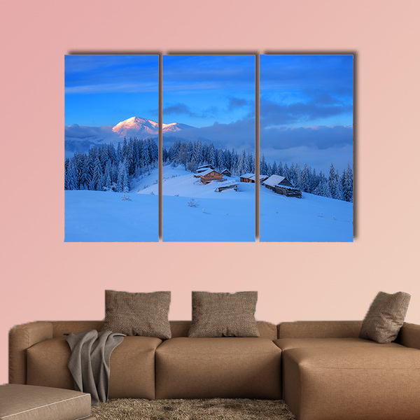 Wooden house in winter forest multi panel canvas wall art