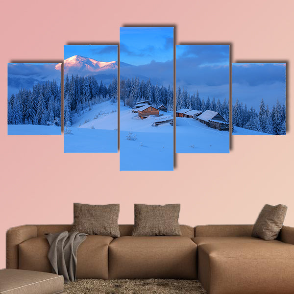 Wooden house in winter forest multi panel canvas wall art