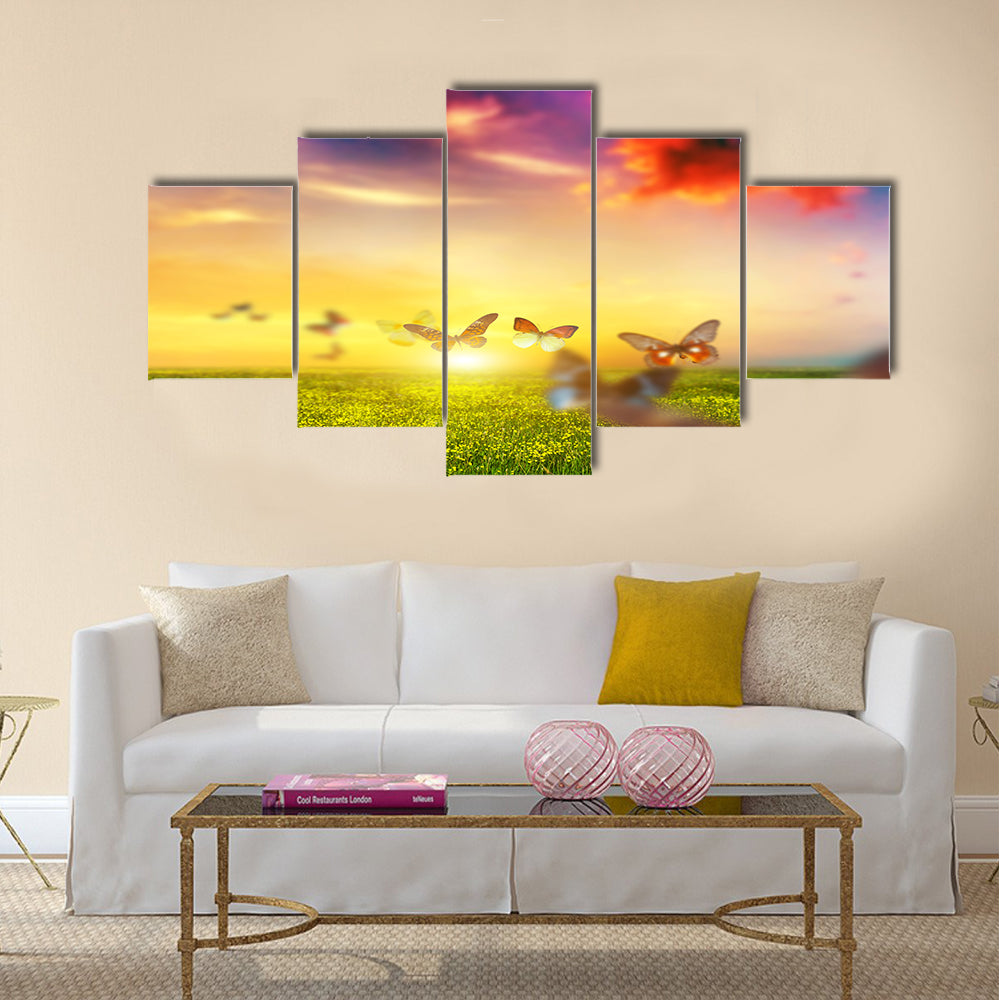 Colorful butterflies flying over spring meadow with flowers Multi Panel Canvas Wall Art