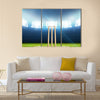 A cricket stadium with cricket pitch Multi panel canvas Wall art