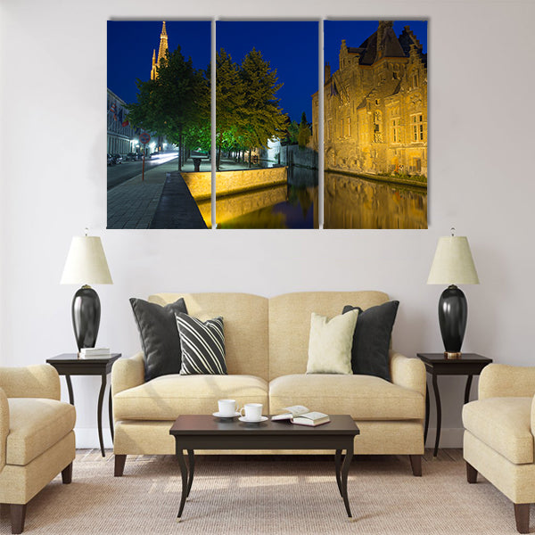 Dijver canal and tower of the Church of Our Lady at night Multi panel canvas wall art