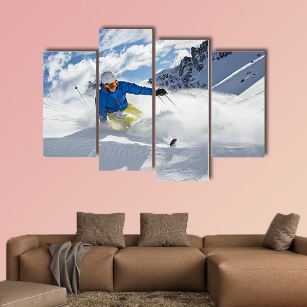 Skier skiing downhill in high mountains during sunny day Multi panel canvas wall art