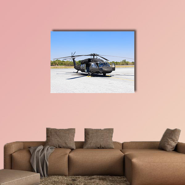 Military helicopter Blackhawk at a base multi panel canvas wall