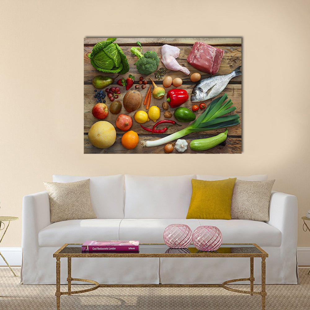 Various Paleo diet products on wooden table, top view Multi panel canvas wall art