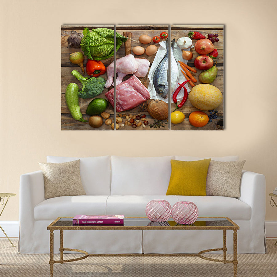 Various Paleo diet products on wooden table, top view Multi panel canvas wall art