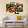 Various Paleo diet products on wooden table, top view Multi panel canvas wall art