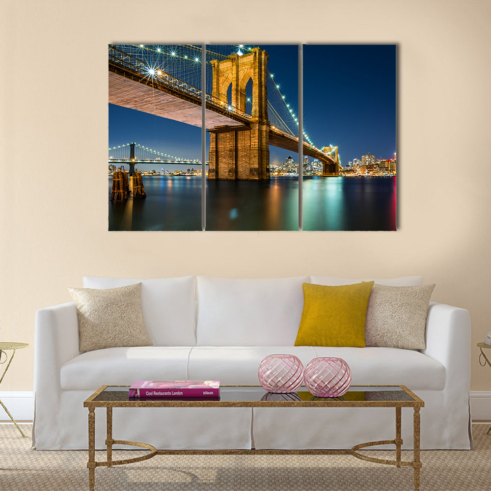 Illuminated Brooklyn Bridge by night Manhattan side Multi panel canvas wall art
