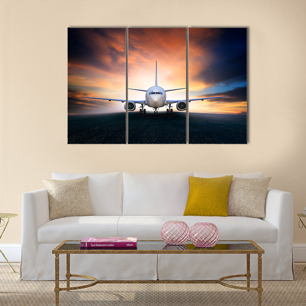 Air plane preparing to take off on airport runways use for air transpor and airliner business traveling multi panel canvas wall art