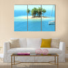 Snorkeling in shallow tropical water multi panel canvas wall art