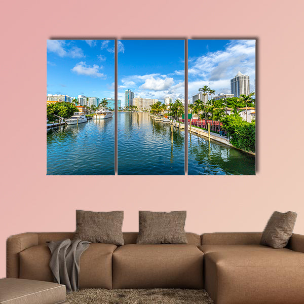 Luxury houses at the canal in Miami Beach with boats Multi panel canvas wall art