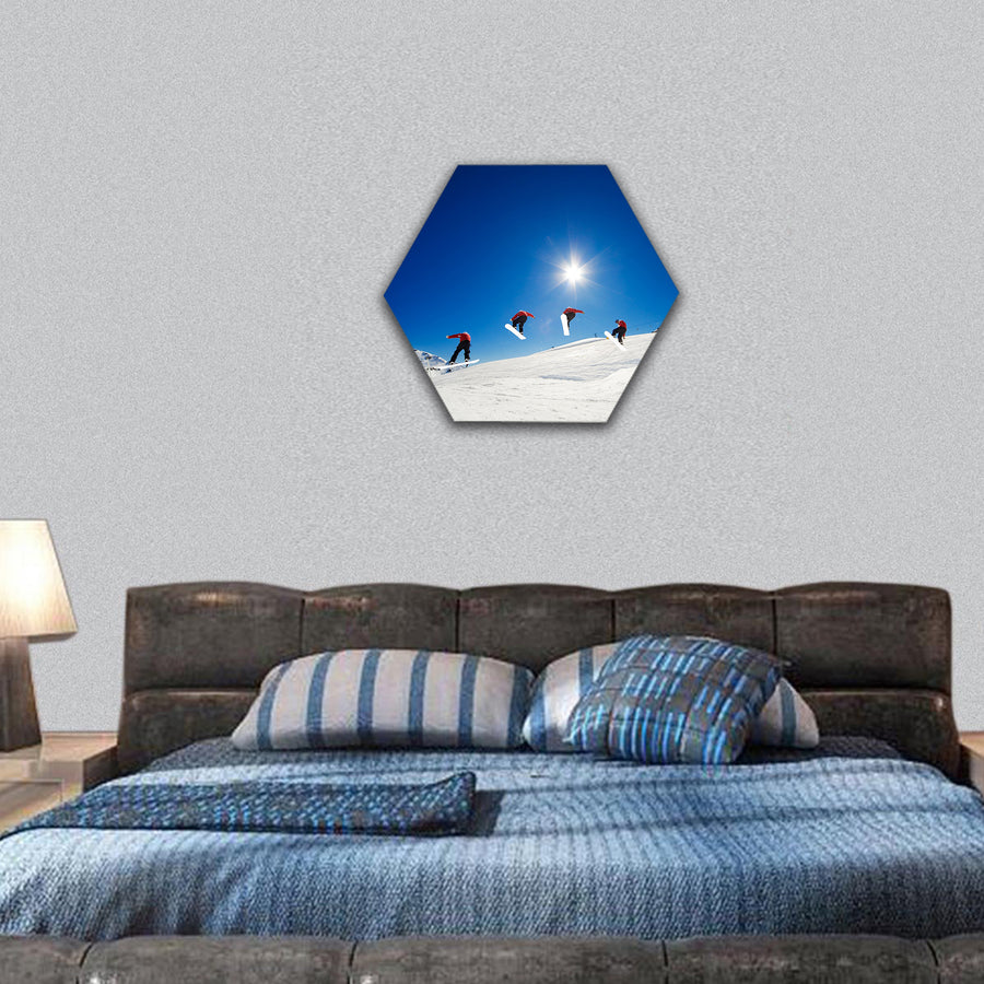 Sequence shot of snowboarder going over jump hexagonal canvas wall art