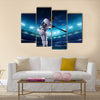 Professional baseball players on the grand arena in night Multi panel canvas wall art