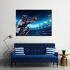 Professional baseball players on the grand arena in night Multi Panel Canvas Wall Art