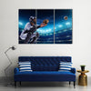 Professional baseball players on the grand arena in night Multi Panel Canvas Wall Art