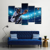 Professional baseball players on the grand arena in night Multi Panel Canvas Wall Art