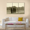 World War II era soldiers on a country road Multi Panel Canvas Wall Art