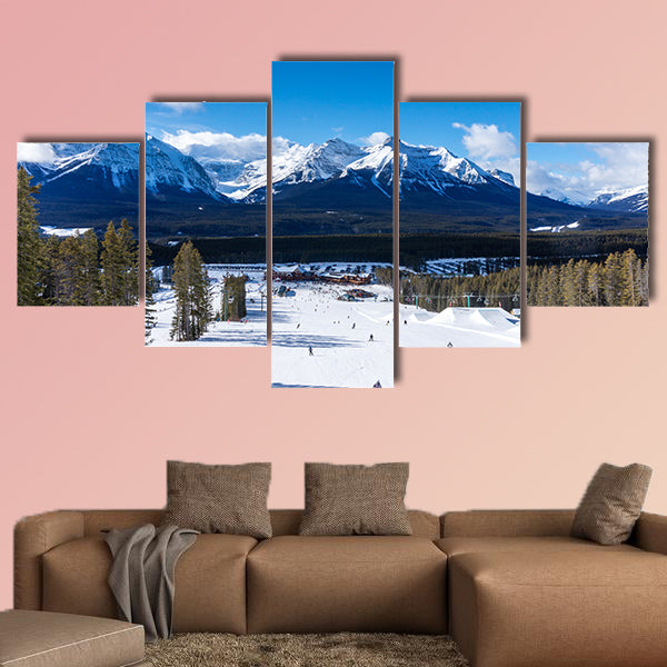 Skiers and snowboarders descend the slopes toward Lake wall art