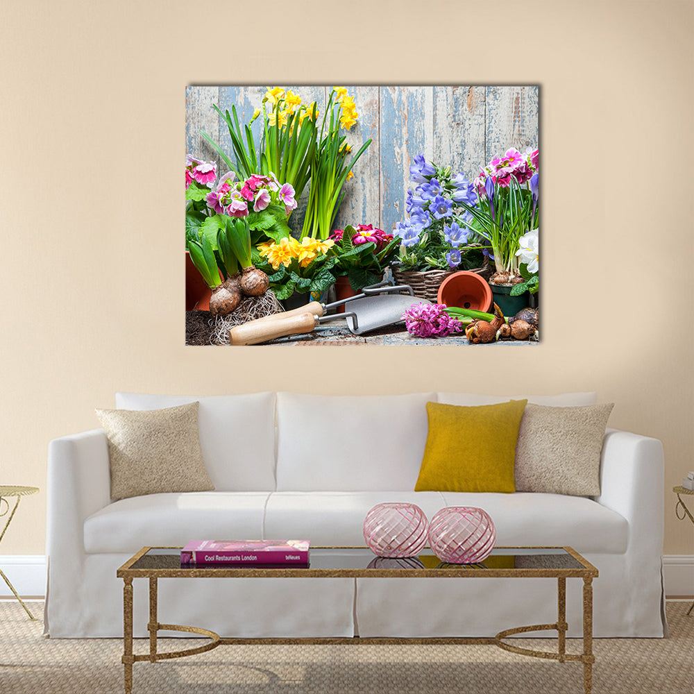 Gardener planting spring flower Multi panel canvas wall art