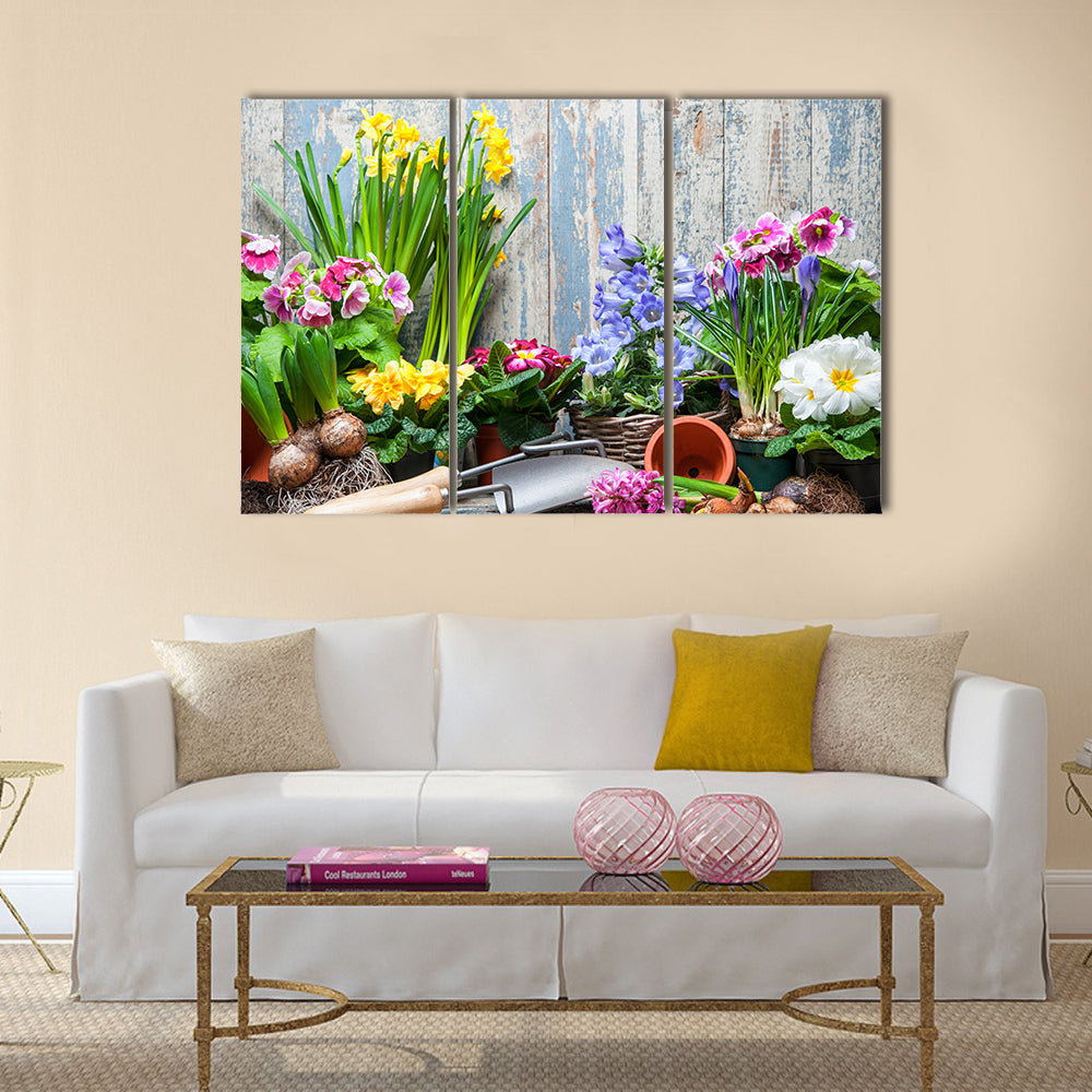 Gardener planting spring flower Multi panel canvas wall art