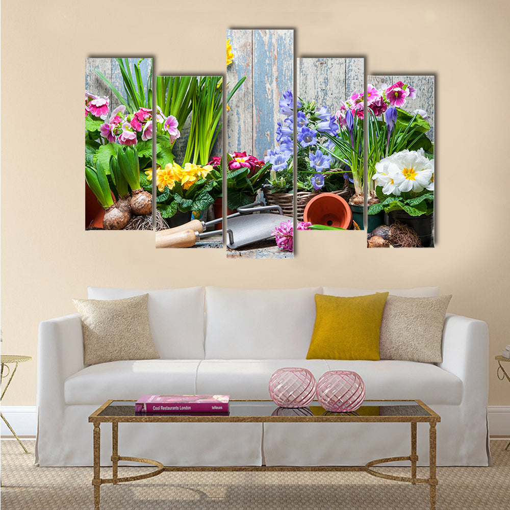 Gardener planting spring flower Multi panel canvas wall art