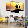 Silhouettes of Team on Mountain Peak Sport and Active Life Concept Multi Panel Canvas Wall Art