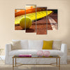 Tennis ball on a tennis court Multi panel canvas wall art