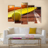 Tennis ball on a tennis court Multi panel canvas wall art