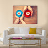 Women and man holding cups of coffee with heart shape symbol Multi Panel Canvas Wall Art