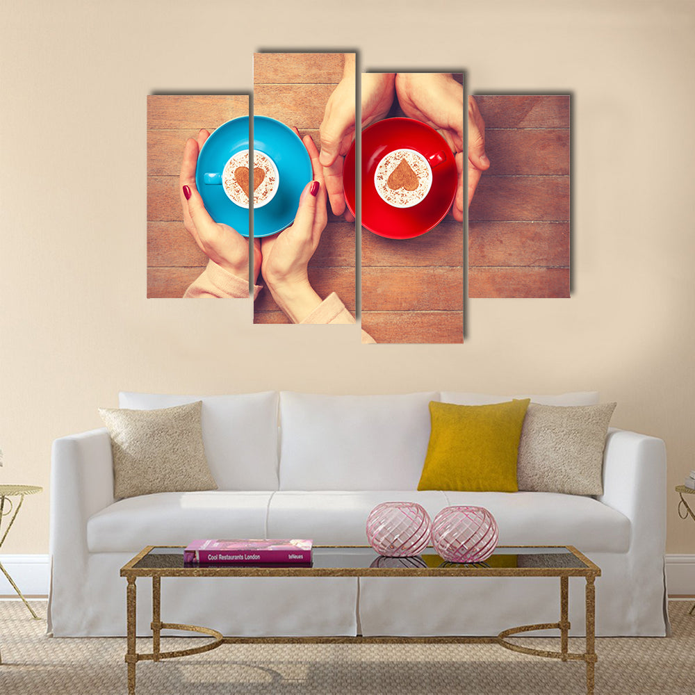 Women and man holding cups of coffee with heart shape symbol Multi Panel Canvas Wall Art