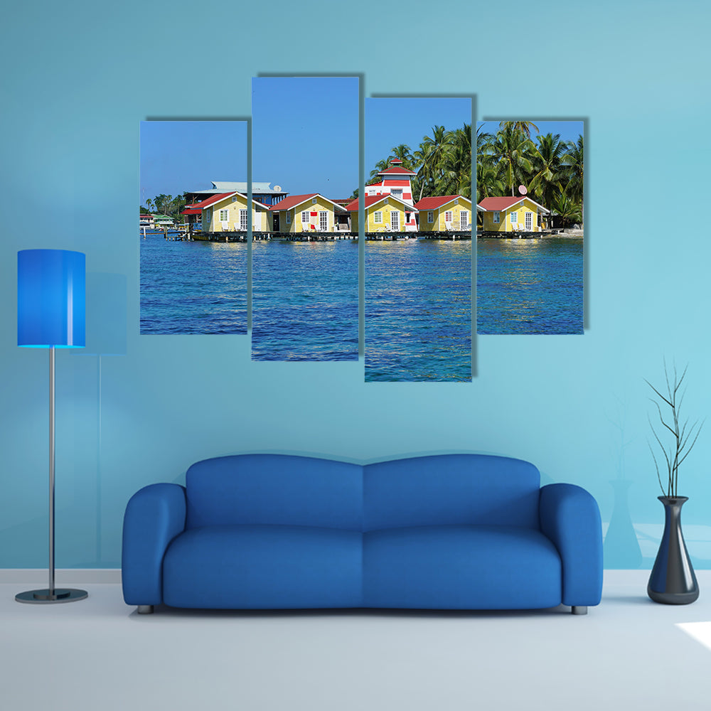 Tropical cabins over water of the Caribbean Sea, multi panel canvas wall art