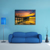 An old floating restaurant view in sunset multi panel canvas wall art