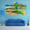 Colorful canoes, kayaks and wooden boats on the alpine lake, Europe multi panel canvas wall art