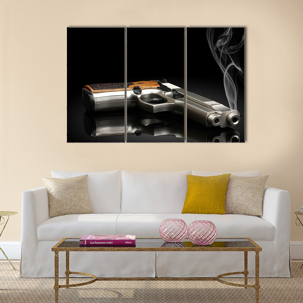 Chromed handgun on black background multi panel canvas wall art