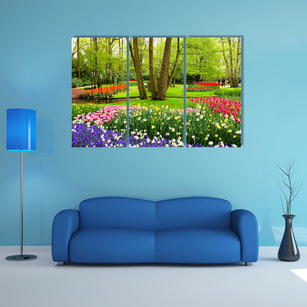 Colorful spring tulips and flowers at Keukenh of Gardens Netherlands multi panel canvas wall art