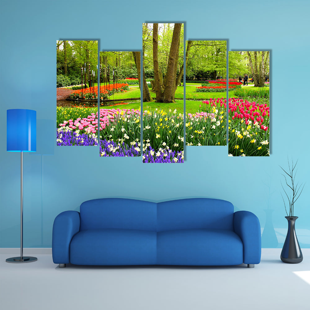 Colorful spring tulips and flowers at Keukenh of Gardens Netherlands multi panel canvas wall art