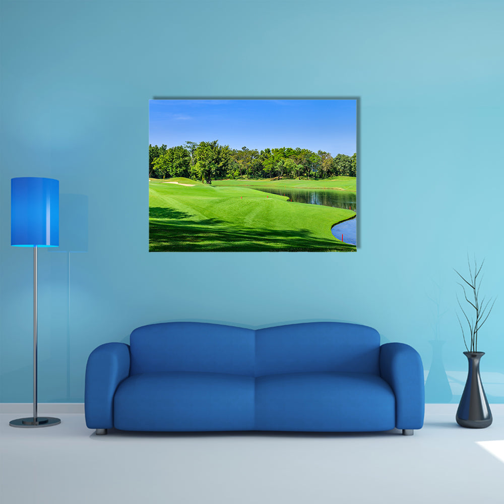 Green golf course in a sunny day, Thailand multi panel canvas wall art