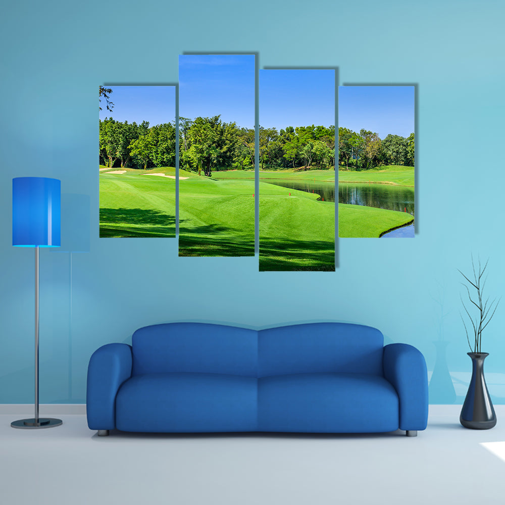 Green golf course in a sunny day, Thailand multi panel canvas wall art