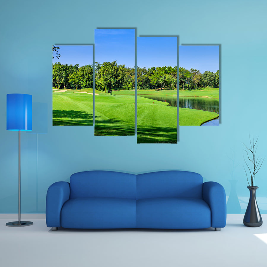 Green golf course in a sunny day, Thailand multi panel canvas wall art