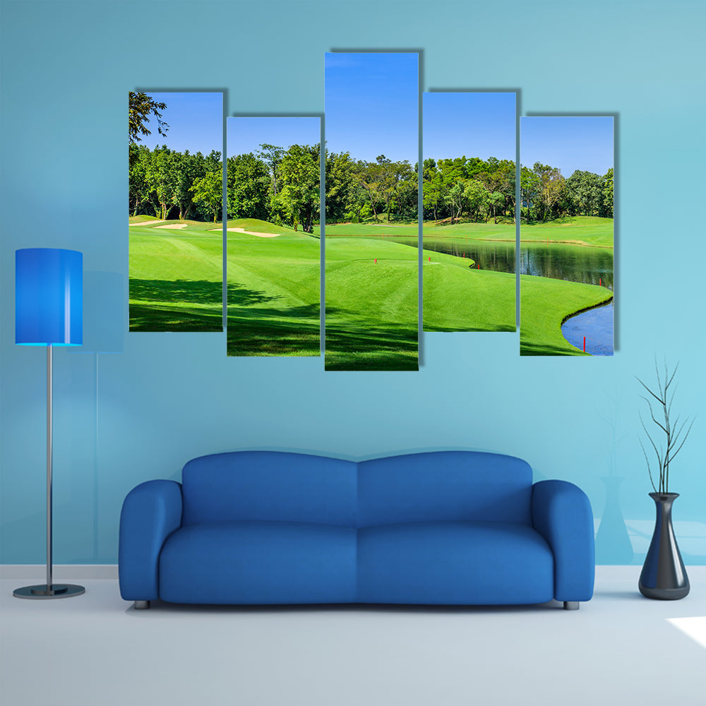Green golf course in a sunny day, Thailand multi panel canvas wall art