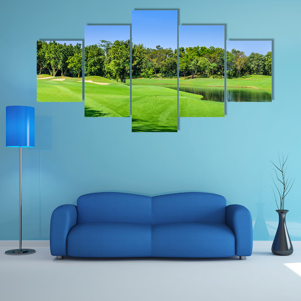 Green golf course in a sunny day, Thailand multi panel canvas wall art