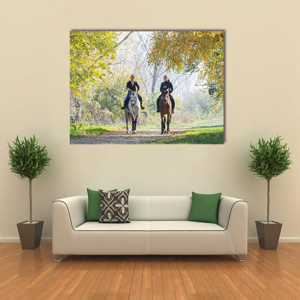 Girls riding a horse on autumn forest multi panel canvas wall art