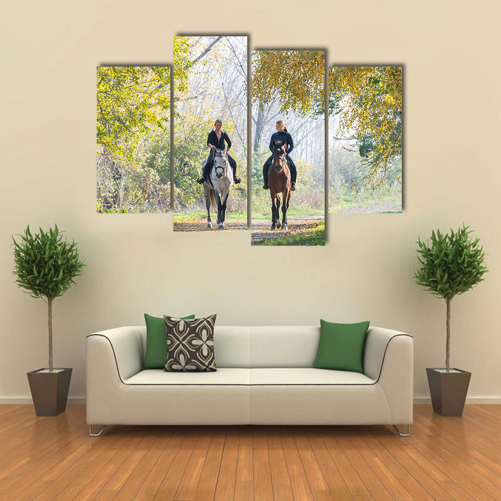 Girls riding a horse on autumn forest multi panel canvas wall art