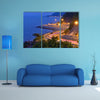 Twilight scene of the road beside mountain and sea multi panel canvas wall art