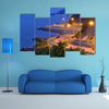 Twilight scene of the road beside mountain and sea multi panel canvas wall art