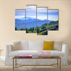 View of the island of Flores, Indonesia showing the mountains go into the sea multi panel canvas wall art